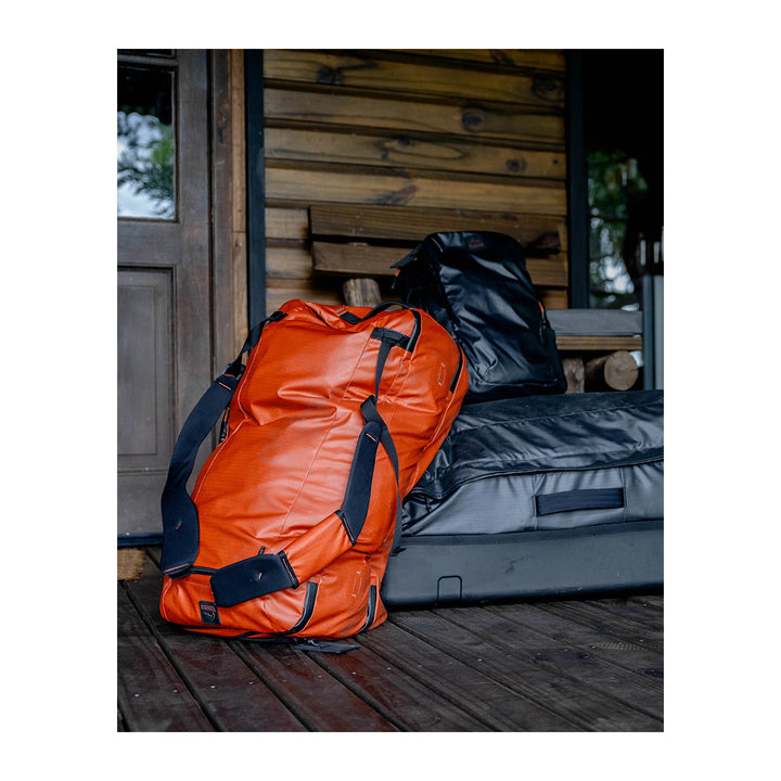 Simms Tailwind 80L Duffel Simms Orange - Madison River Fishing Company