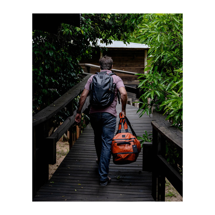 Simms Tailwind 80L Duffel Simms Orange - Madison River Fishing Company