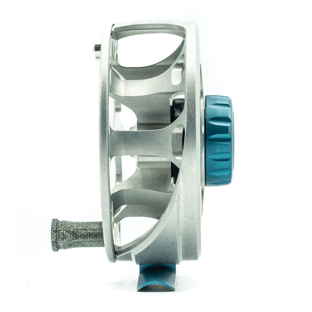 Metallic fishing reel with a blue accent on a white background