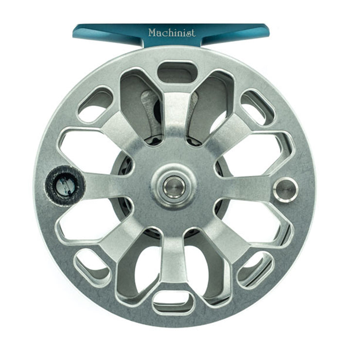 Metallic fishing reel with blue handle on a white background