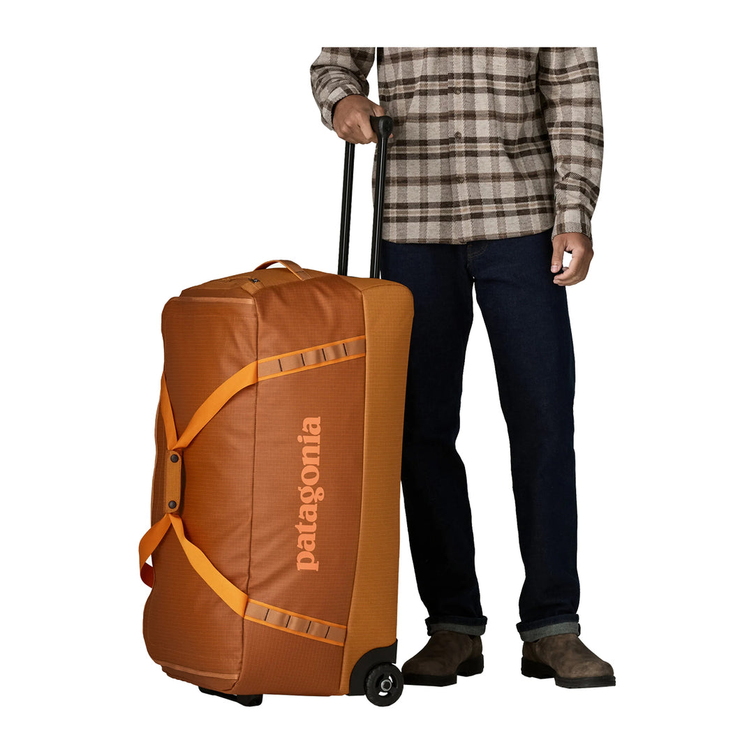 orange patagonia duffel Black Hole Wheeled 100 Liter Cinnamon Brown Kit Material:Spool - Shielded Ceramic Hybrid womens brown: Backpacks | seasonal closing mesh pockets on