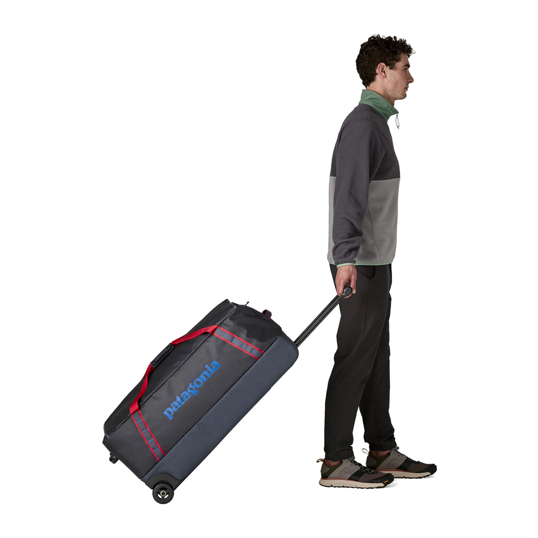 Patagonia Black Hole Wheeled Duffel 100L Smolder Blue w/Amanita Red
